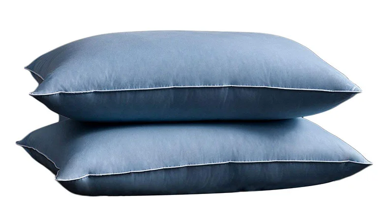 Down Pillows vs. Feather Pillows - What's the Difference? 3 two big blue pillows for sleeping