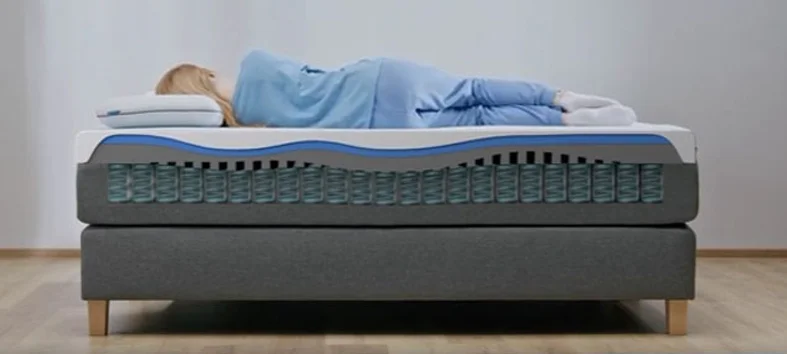 Emma CliMax Mattress Review 6 woman is sleeping on Emma CliMax mattress