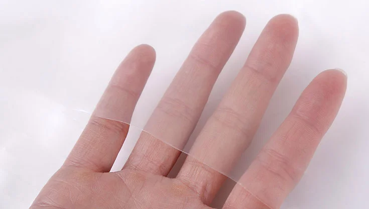 How To Compress a Memory Foam Mattress do it yourself at home 3 Hand is holding plastic transparent material