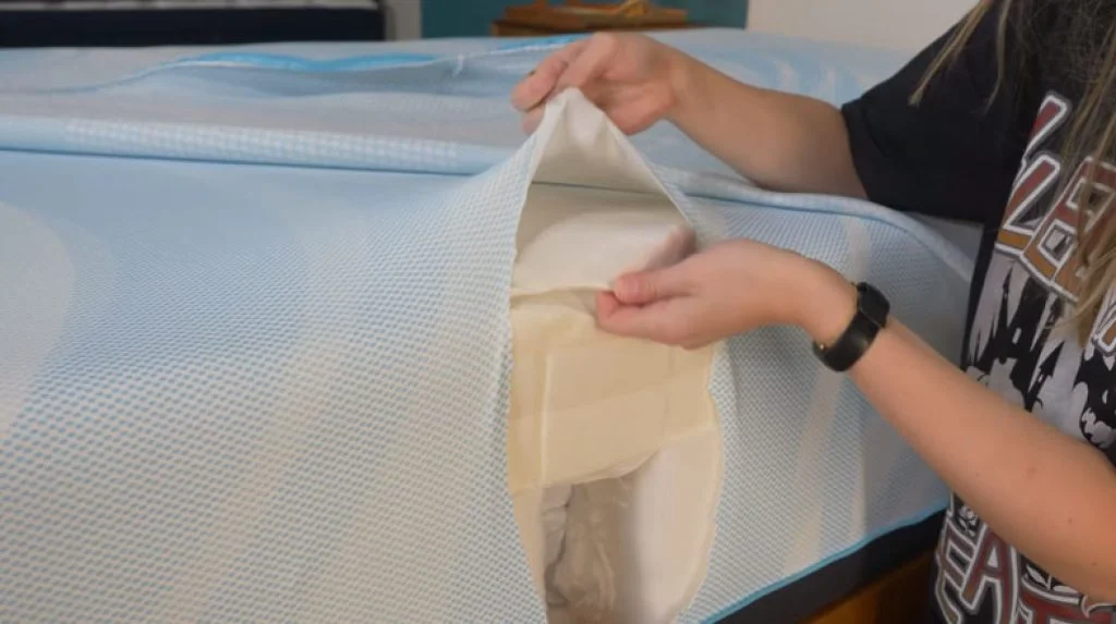 Best Mattress Under $2000 38 Julia showing us construction of Tempur-Pedic LuxeBreeze