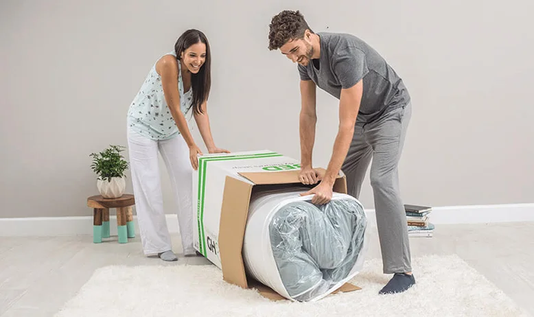 couple is unpacking ghostbed