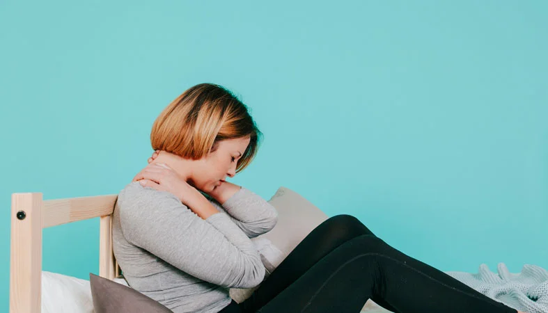 Sleeping on a Bad Mattress – What Are The Symptoms And What To Do? 2 woman with neck pain