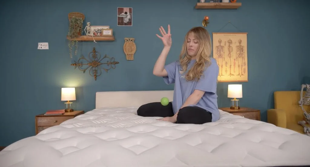Nolah vs. Helix Mattress Comparison for 2026 13 Nolah Evolution bounce test