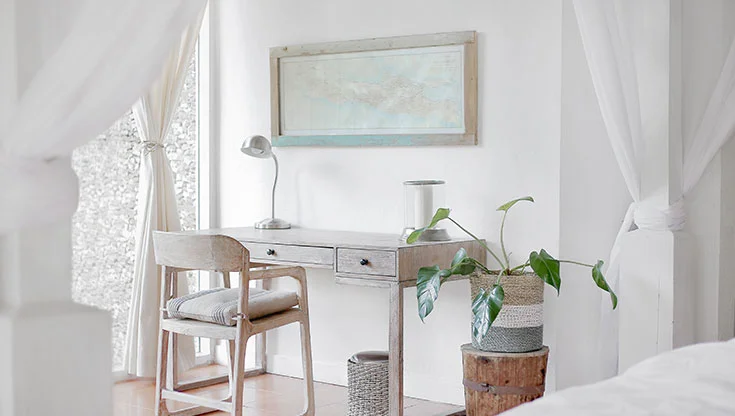 Light white room with a chair and a desk